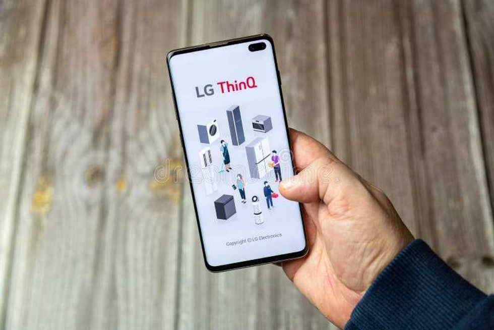 03-10-2021 Portsmouth, Hampshire, UK A Mobile phone or cell phone being held in a hand with the app open on screen. 03-10-2021 Portsmouth, Hampshire, UK A Mobile stock photography