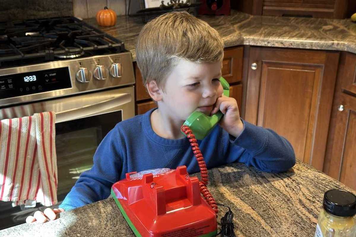 a child speaking with Santa on Santa's Magical Telephone