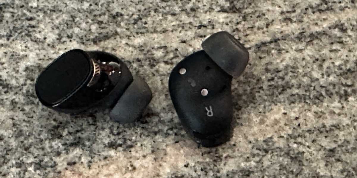 a close up of Poly Voyager Free 20 True Wireless Earbuds