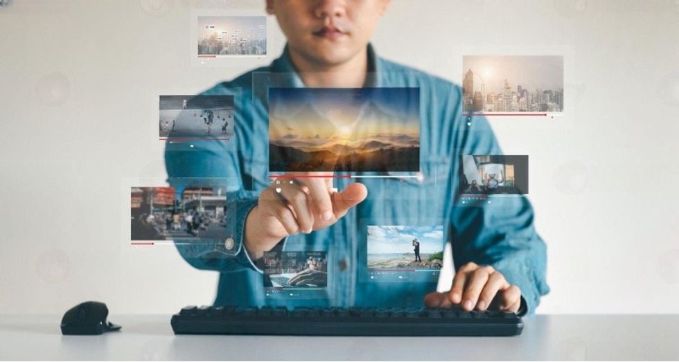 a man moving virtual displays with his finger