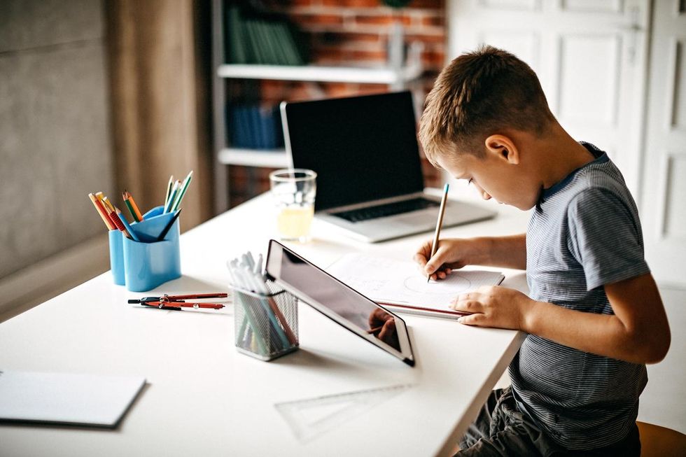 a phoot of a student using digital textbooks at home