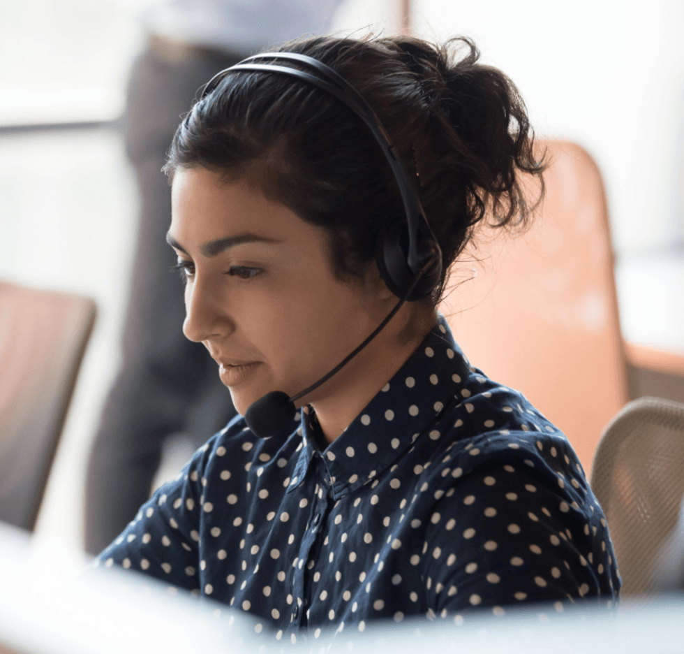 a photo of a Alexa Emergency Assist support person on the phone