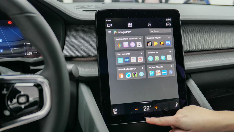 a photo of a car display showing apps