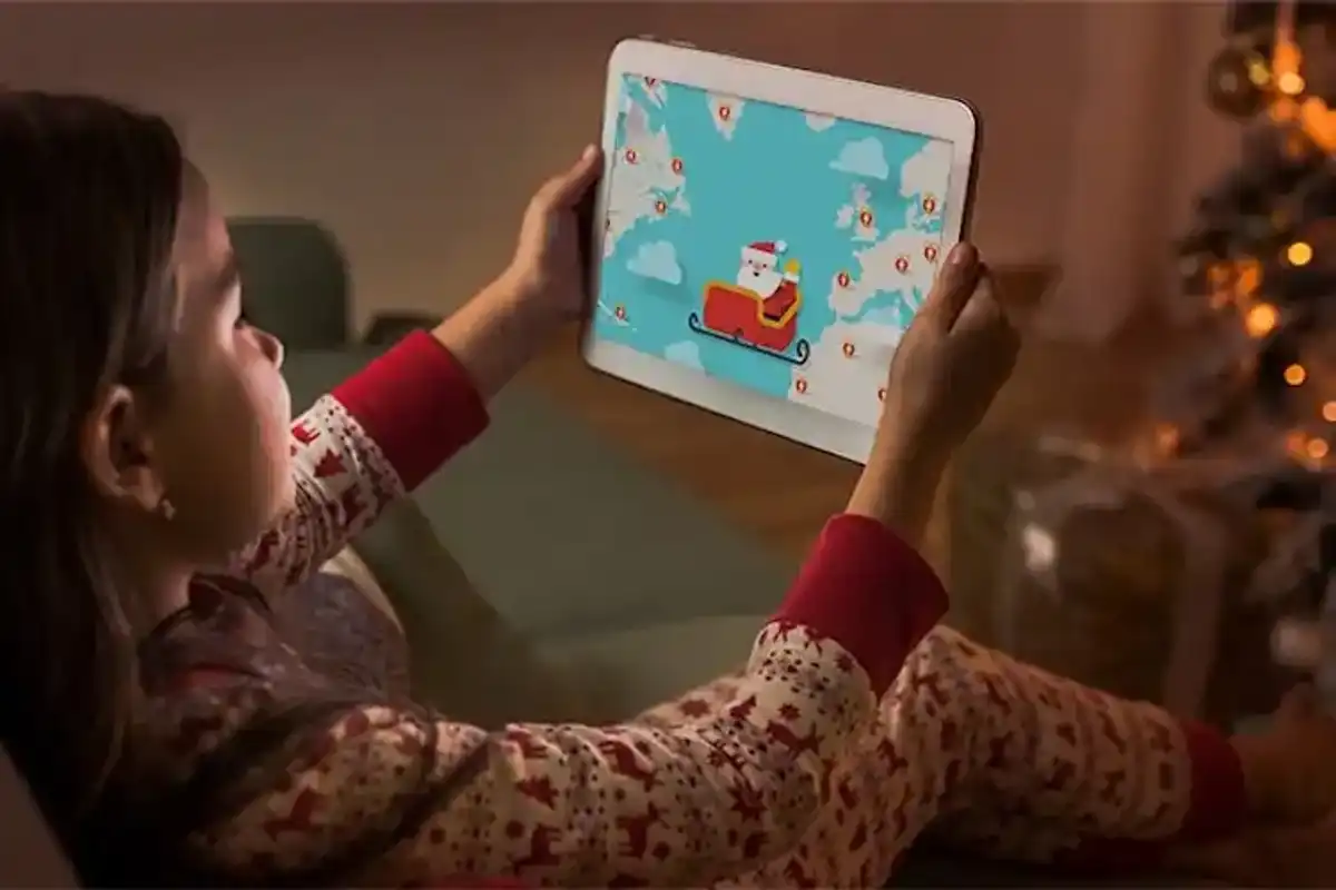 a photo of a child tracking santa on a tablet