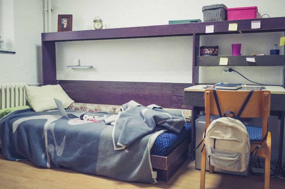 a photo of a college dorm room with smart and connected devices.