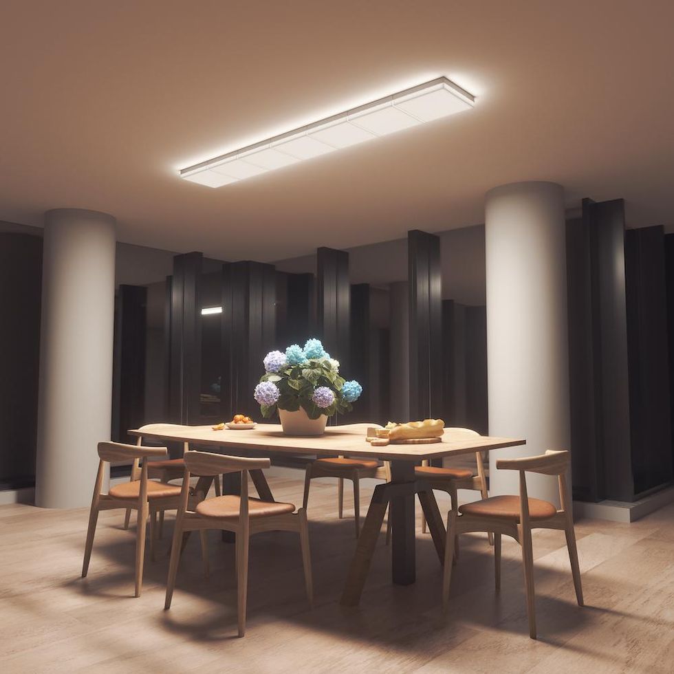 a photo of a dinning room with nanoleaf skylight