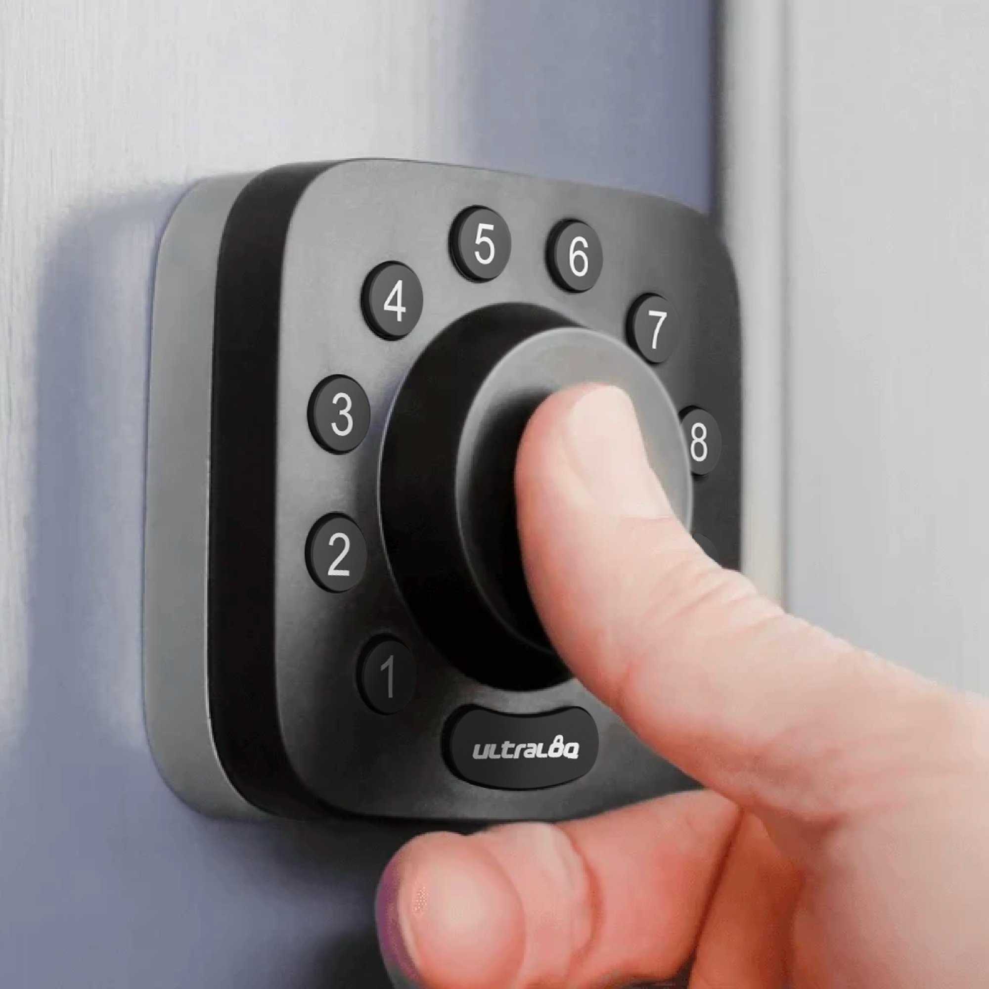a photo of a finger pressing on ULTRALOQ U-Bolt Pro WiFi smart lock.