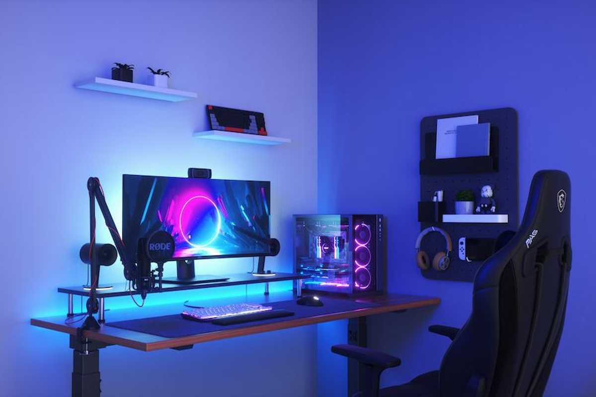 a photo of a gaming station with nanoleaf smart lightstrips
