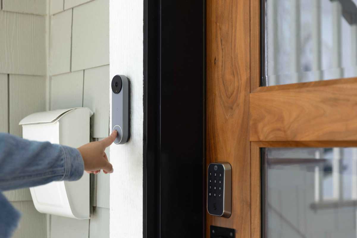 a photo of a google nest doorbell and a front door with Yale Assure Lock 2 Touch smart lock.