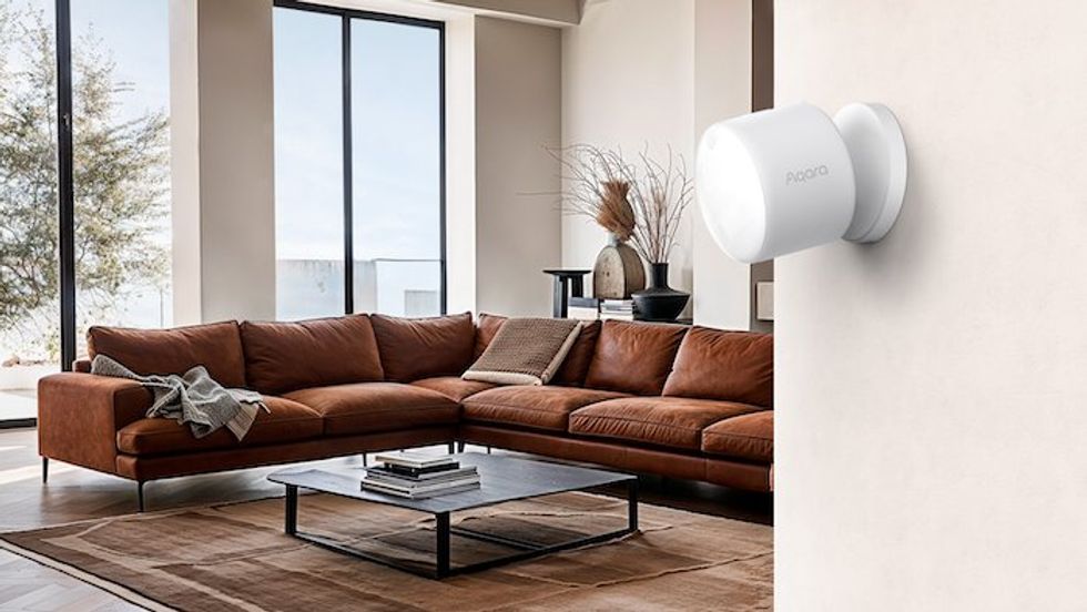 a photo of a living room with Presence Multi-Sensor FP300 on the wall