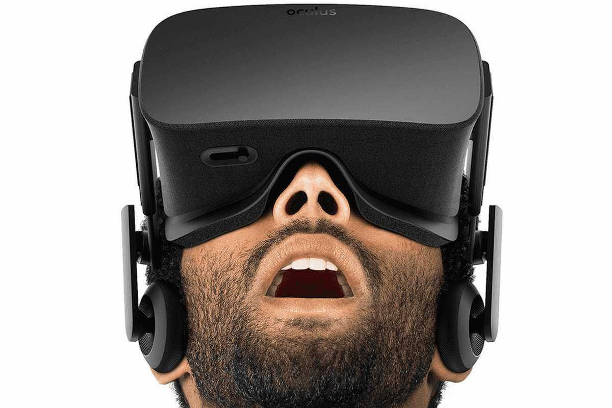 a photo of a man wearing VR headset looking up