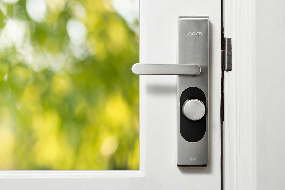 a photo of a smart lock on a door