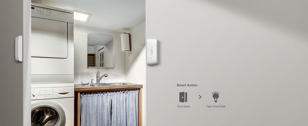 a photo of a Tapo T110 smart contact sensor on a wall