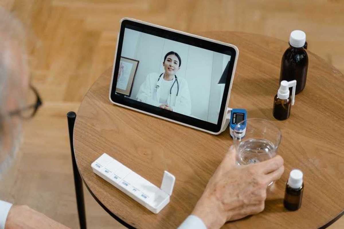 a photo of a telehealth call with a doctor