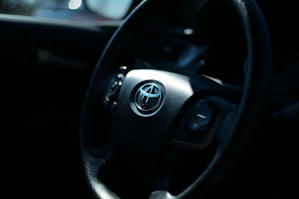 a photo of a toyoata car's steering wheel