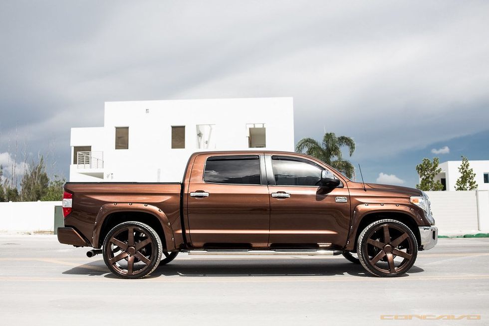 a photo of a Toyota Tundra parked outside a home.