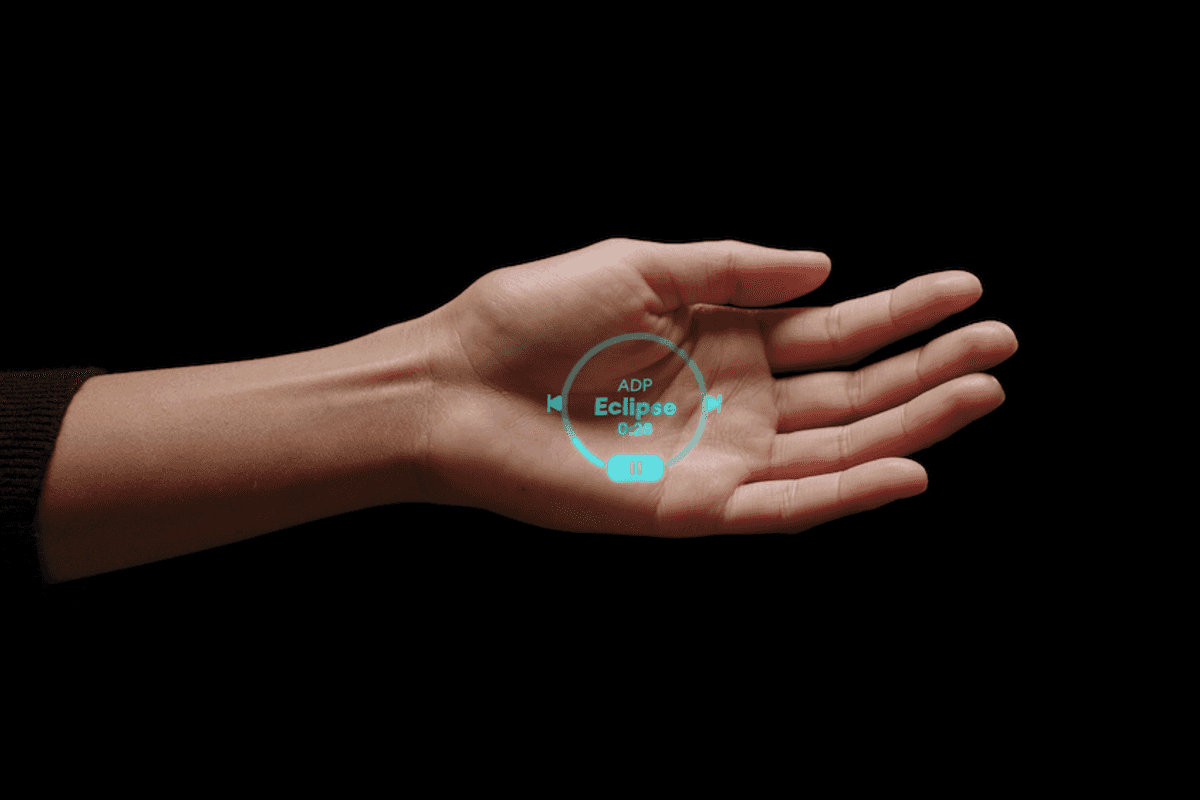 a photo of a woman's hand showing a message from humane ai pin