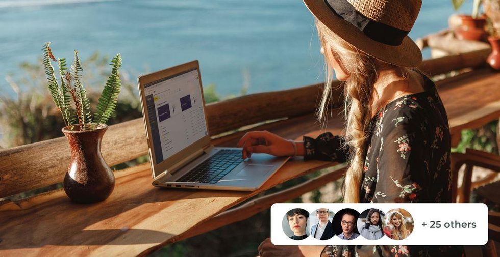 a photo of a woman using Trint on a laptop