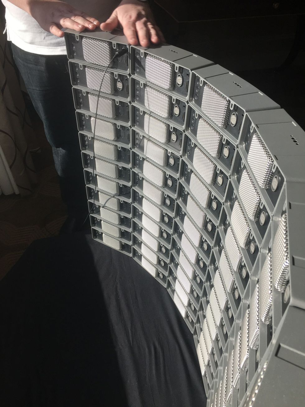 a photo of aiFi speakers stacked