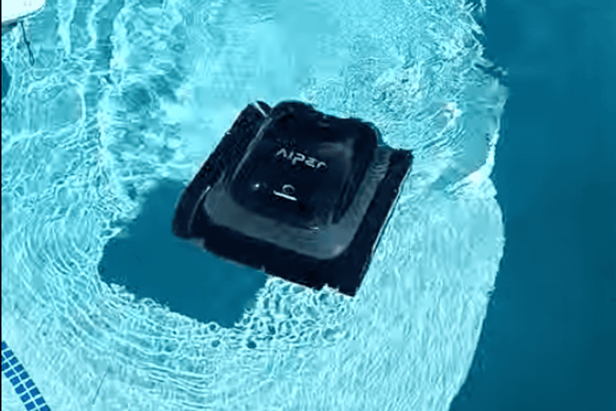 a photo of Aiper Scuba S1 Cordless Robotic Pool Cleaner submerging in a pool