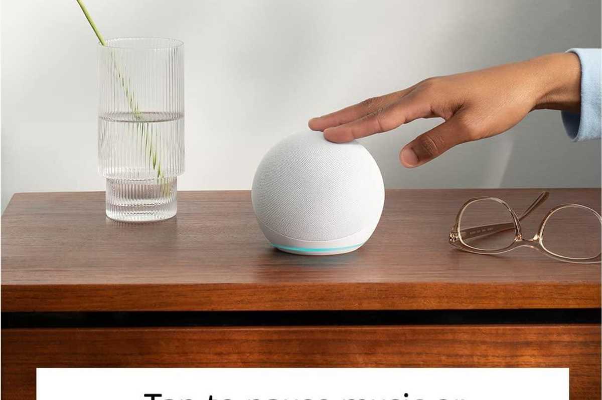 a photo of amazon echo dot 5th gen on an nightstand