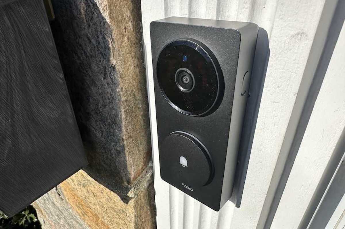 a photo of Aqara Doorbell Camera Hub G410 installed on a house in daytime