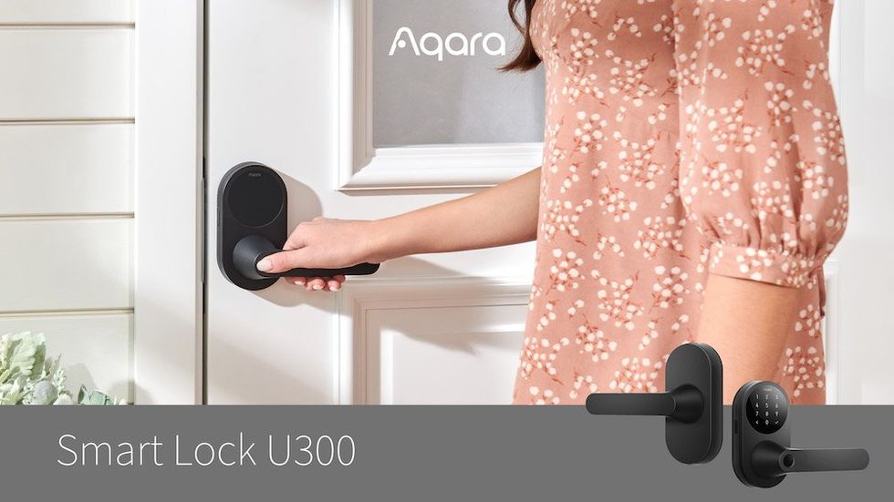 a photo of Aqara U300 smart lock on a door with a woman opening it up
