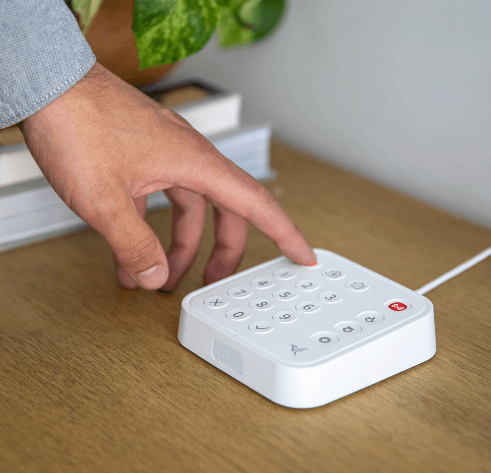 a photo of Arlo total security sensor hub