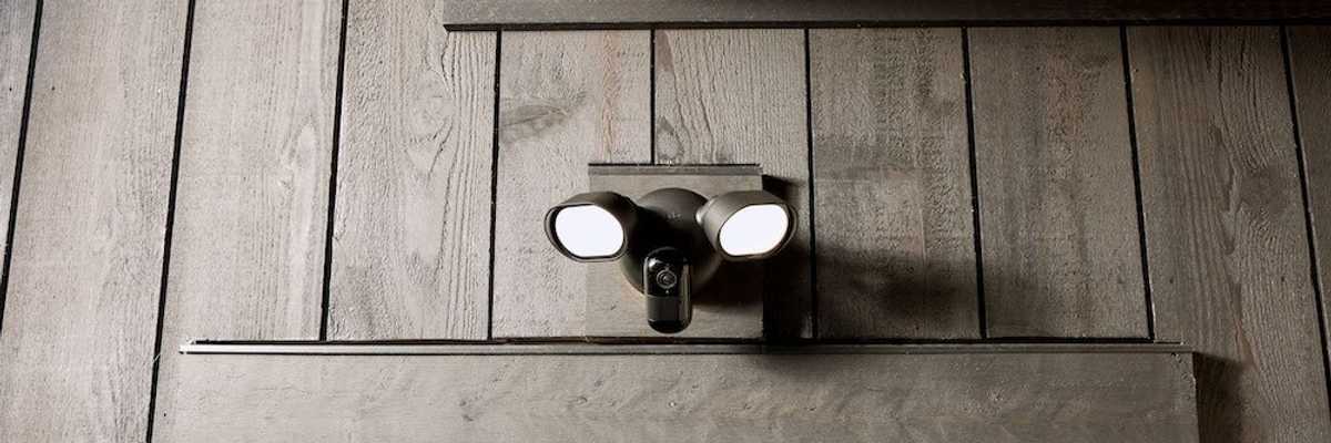 a photo of Arlo Wired Floodlight Camera above a window