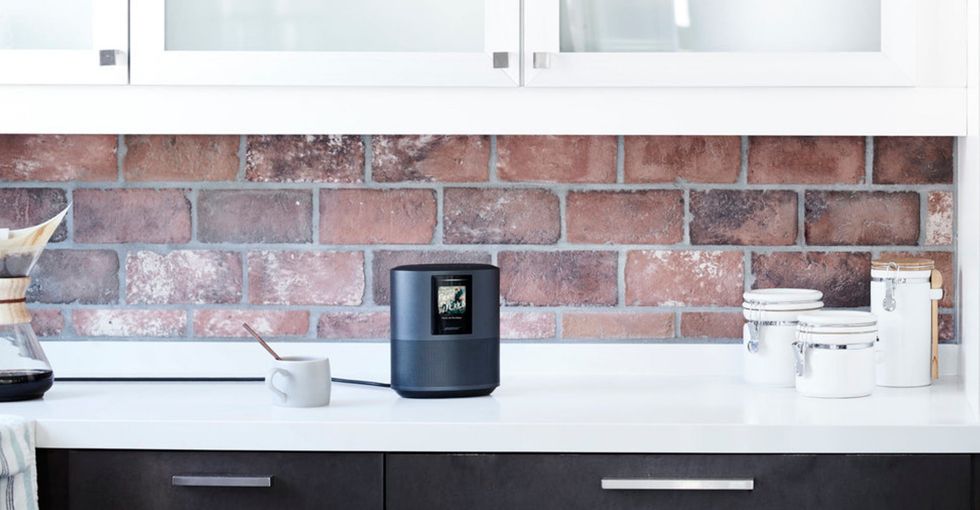 a photo of Bose smart speaker on a kitchen counter