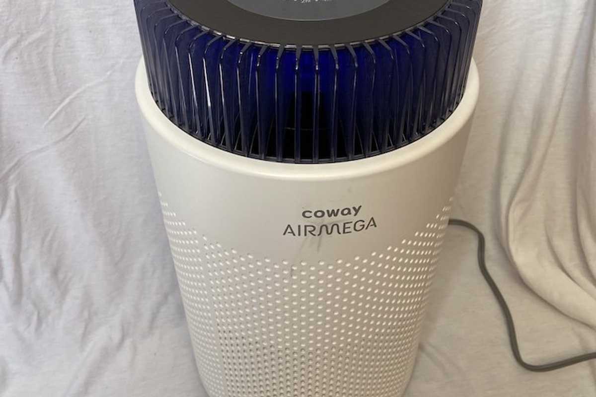 a photo of Coway Airmega 100 Air Purifier in an apartment.