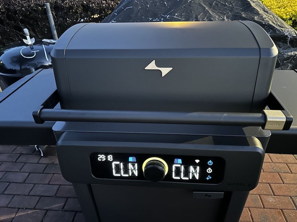 a photo of Current Model G Dual Zone Grill in SmartClean mode