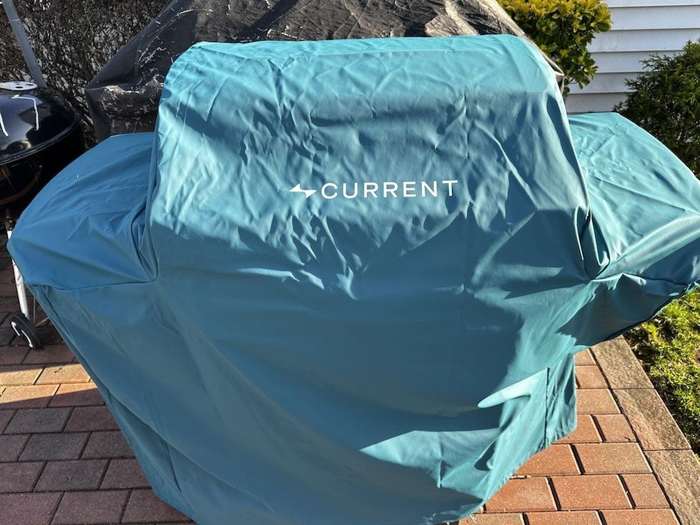 a photo of Current Model G Dual Zone Grill with cover