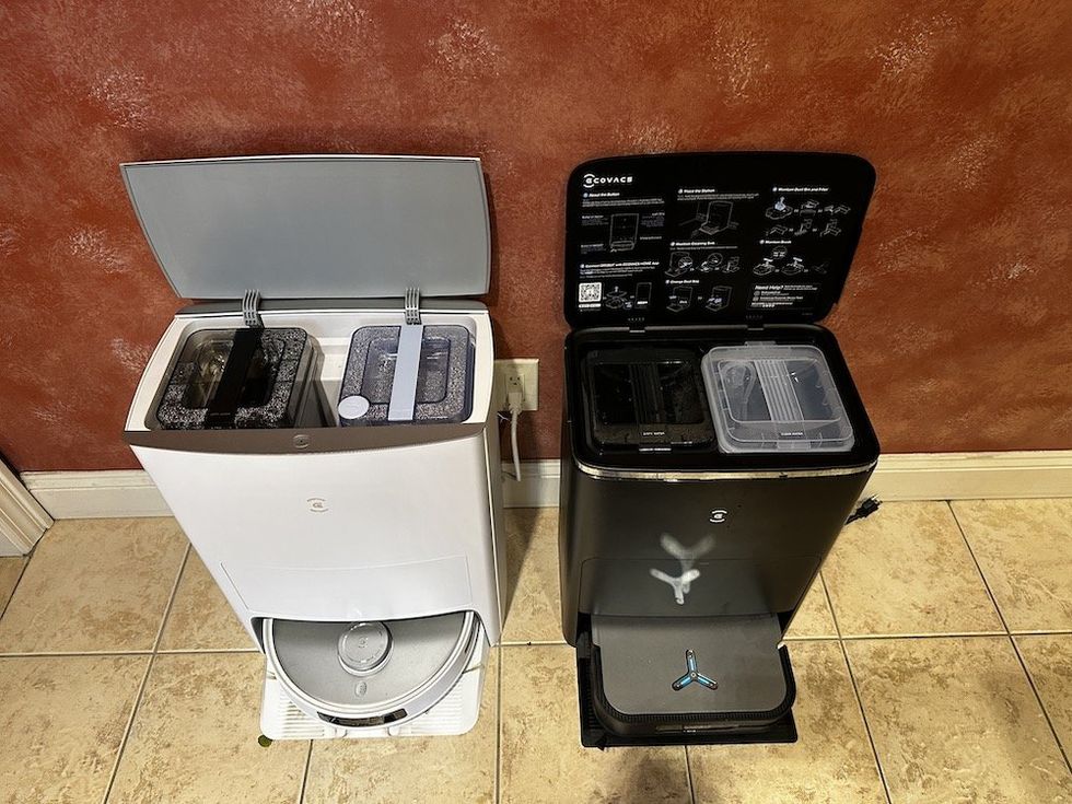 a photo of Deebot T20 and X2 stations with lids open.