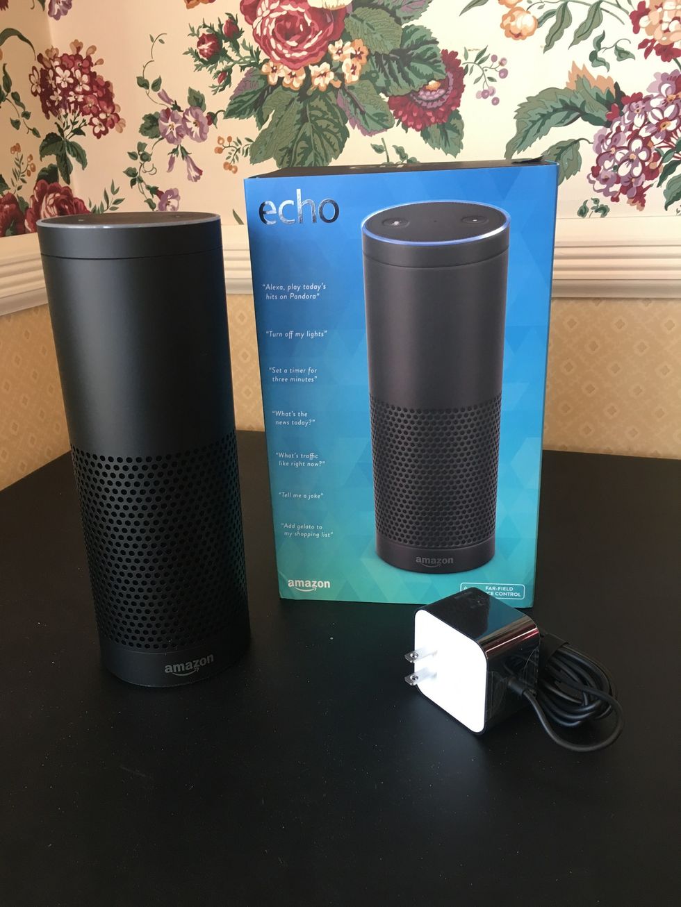 a photo of echo 1st gen speaker unboxed