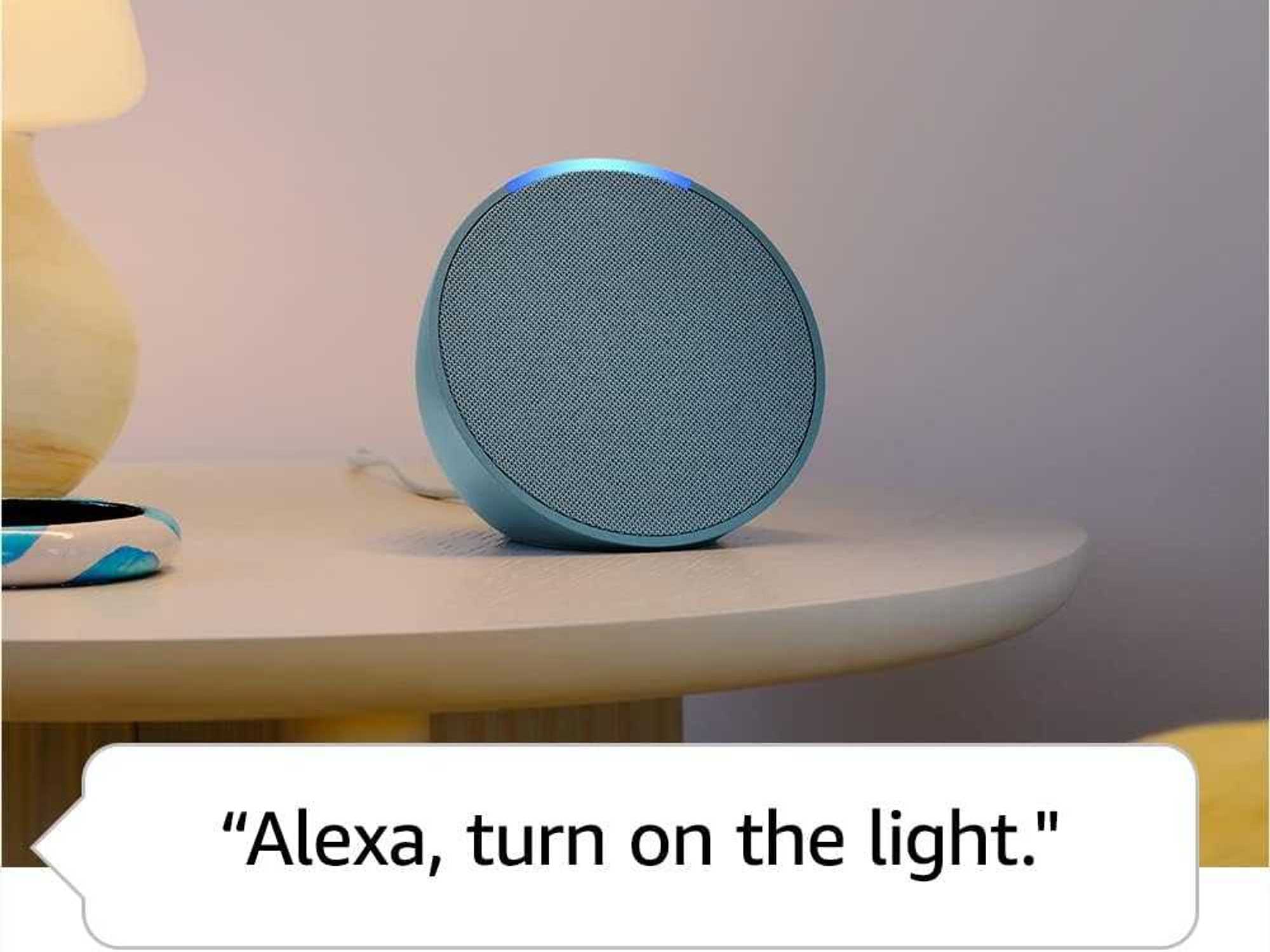 a photo of echo pop with command Alexa turn on the light.