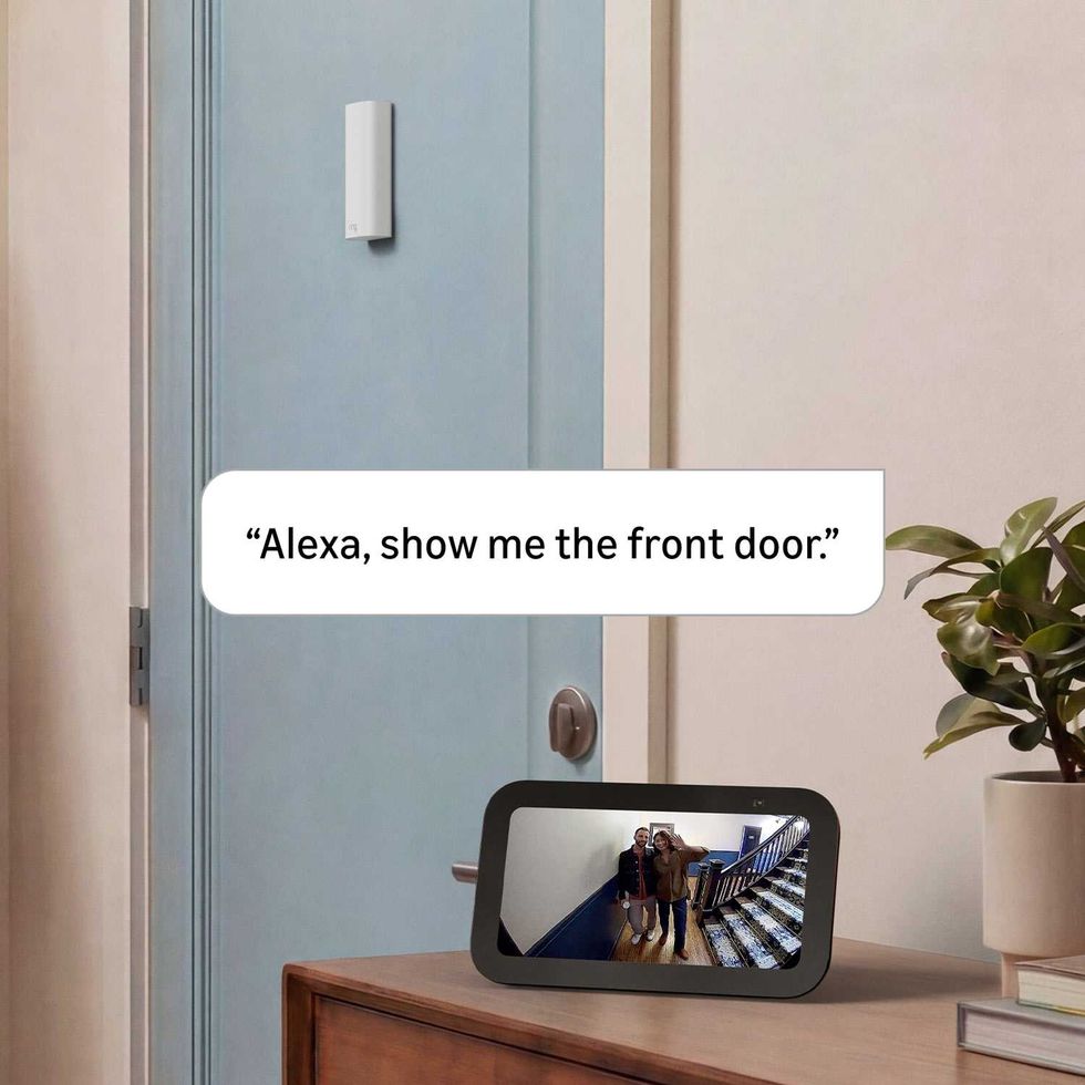 a photo of Echo Show and Ring Peephole Cam 2K on a door