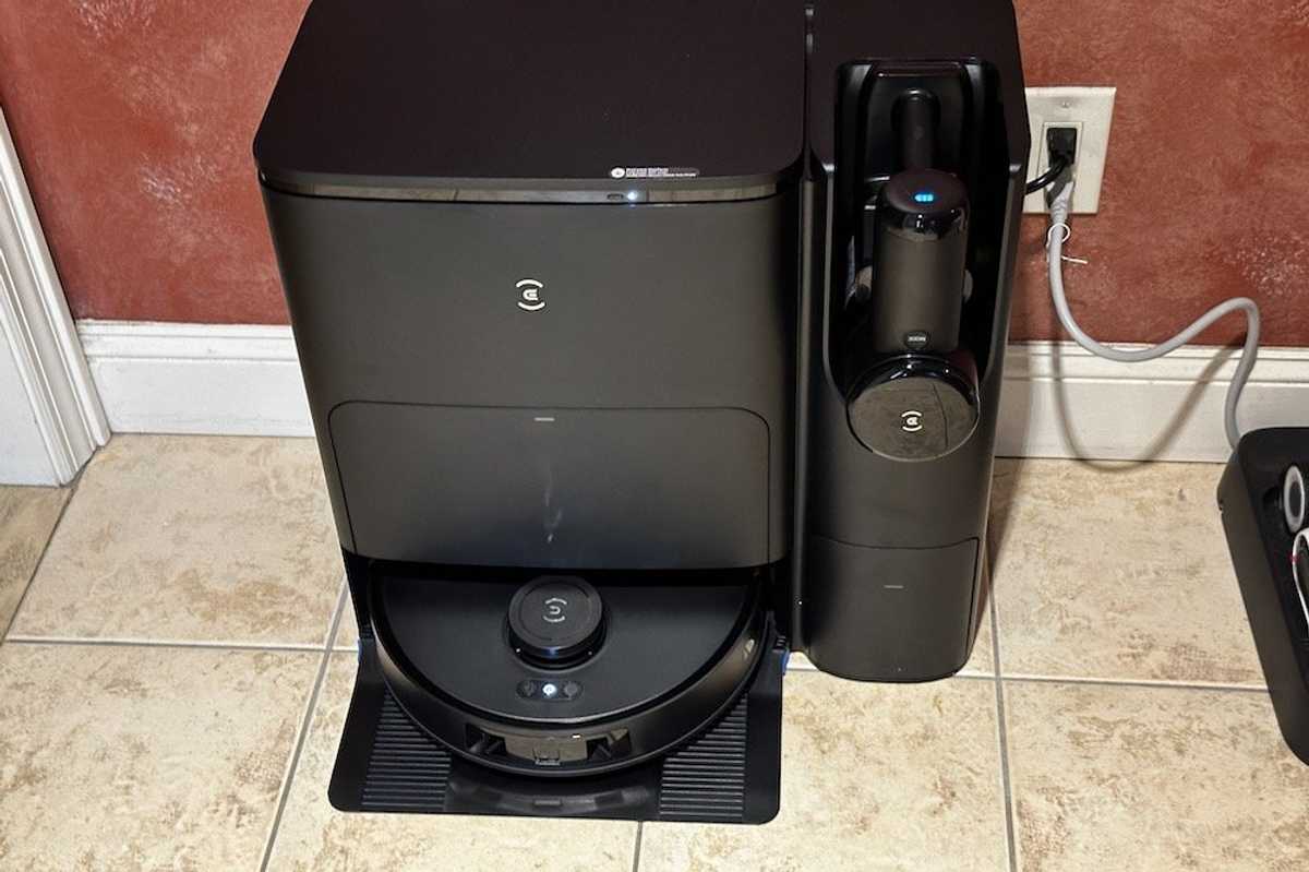 a photo of Ecovacs DEEBOT T30S Combo Robot Vacuum and Mop installed on a kitchen floor