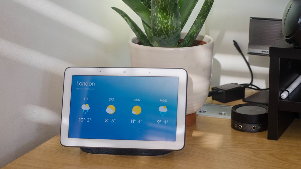 a photo of google home hub on a desk