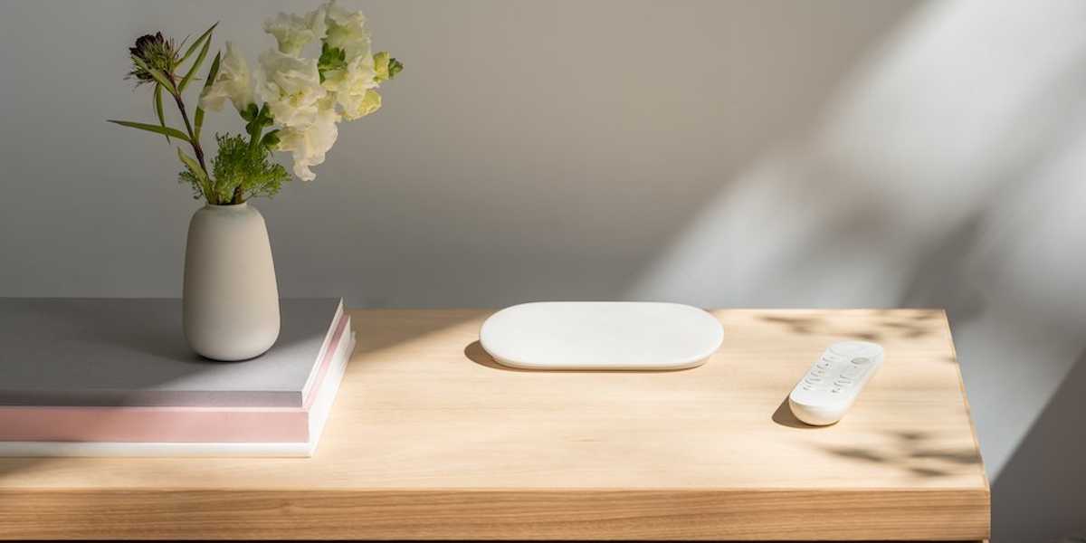 a photo of Google TV Streamer and smart home hub on a cradenza.