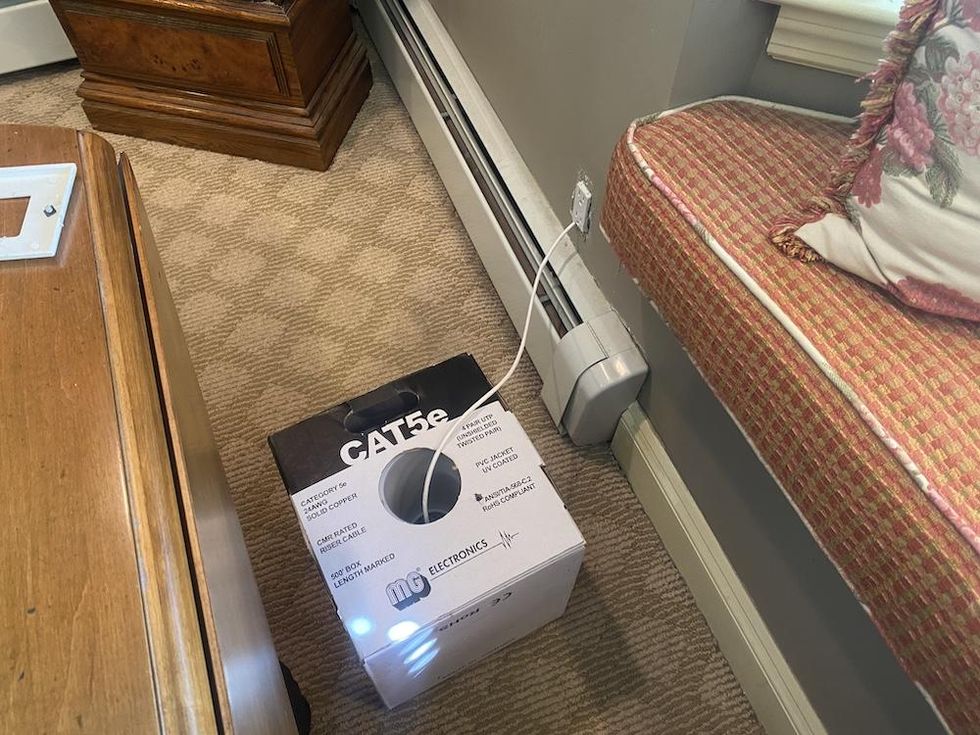 a photo of installing Cat5e cable inside our test home