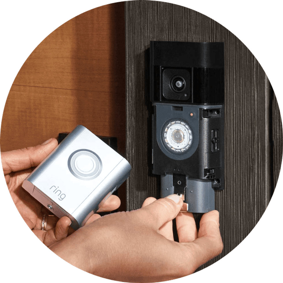 a photo of installng the battery into a Ring Battery Video Doorbell Pro