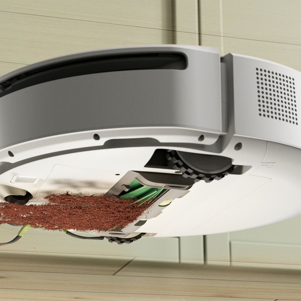 a photo of iRobot Roomba 205 Vac cleaning the floor