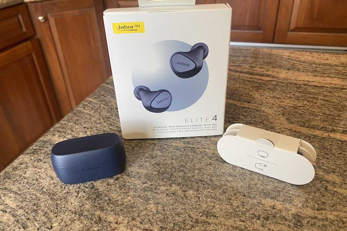 a photo of Jabra Elite 4 ANC Wireless Earbuds on a countertop unboxed.
