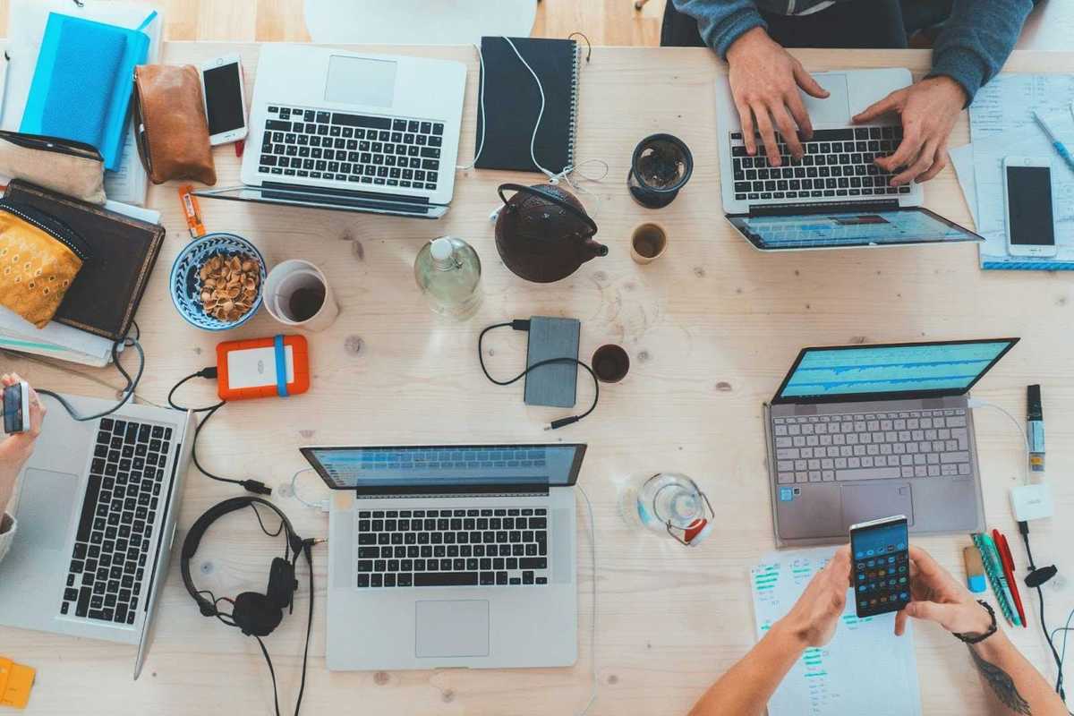 a photo of laptops on a desk