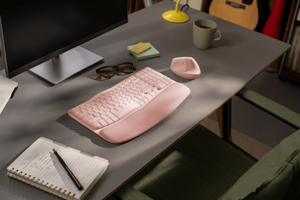 a photo of Logitech Wave Keys Ergonomic Keyboard off white on a desk