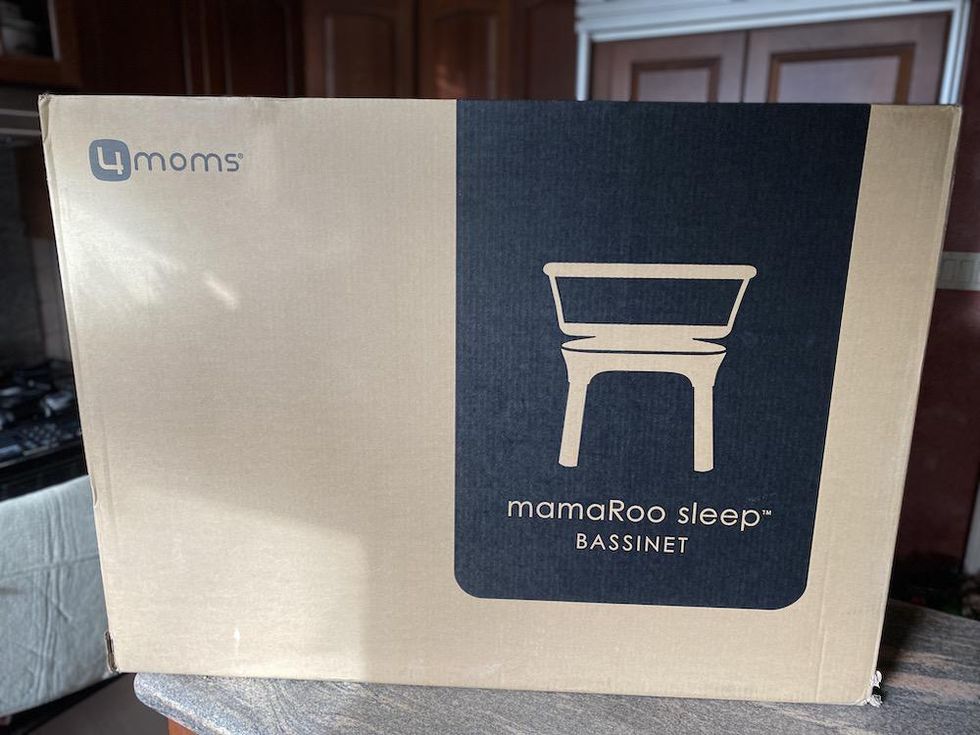 a photo of mamaRoo Sleep Bassinet box\u00a0on a counter