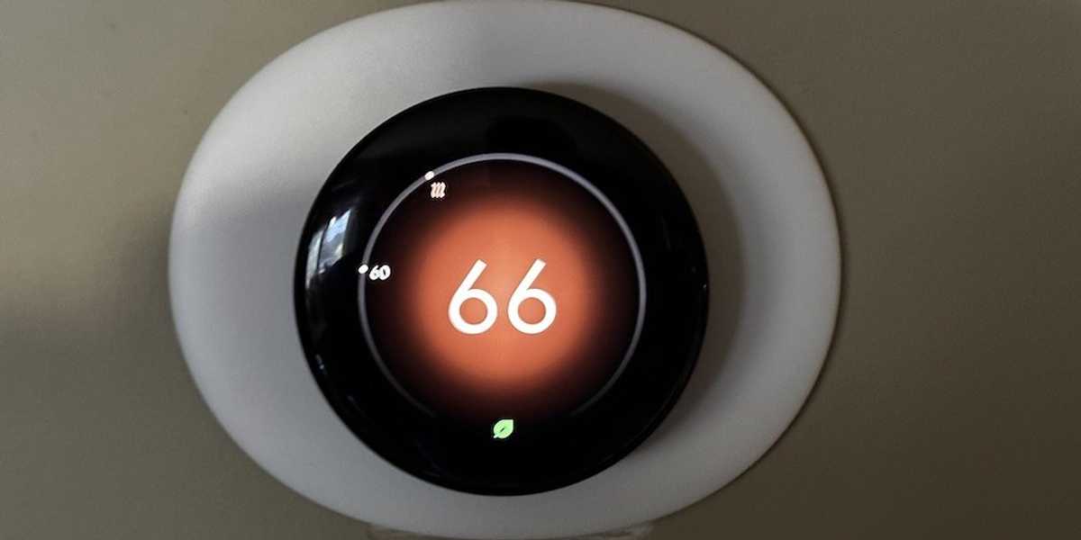 a photo of new Google Nest Learning Thermostat 4th Gen on a wall