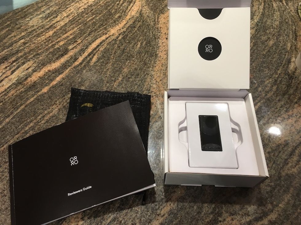 a photo of orro switch in box with owner's manuals
