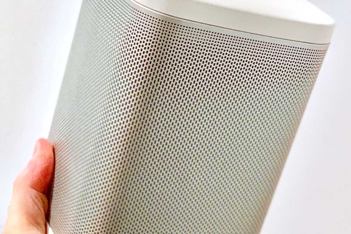 a photo of Riva concert speaker in a man's hand